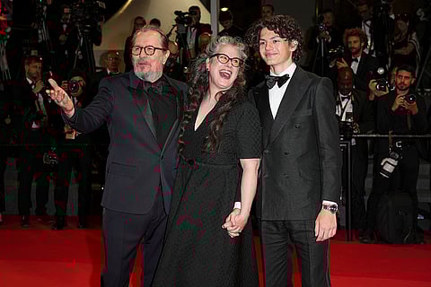 Gary Oldman, Gisele Schmidt and William Schmidt